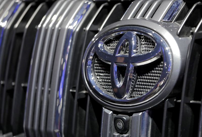 &copy; Reuters. The Toyota company logo is pictured at the India Auto Show 2018 in Greater Noida