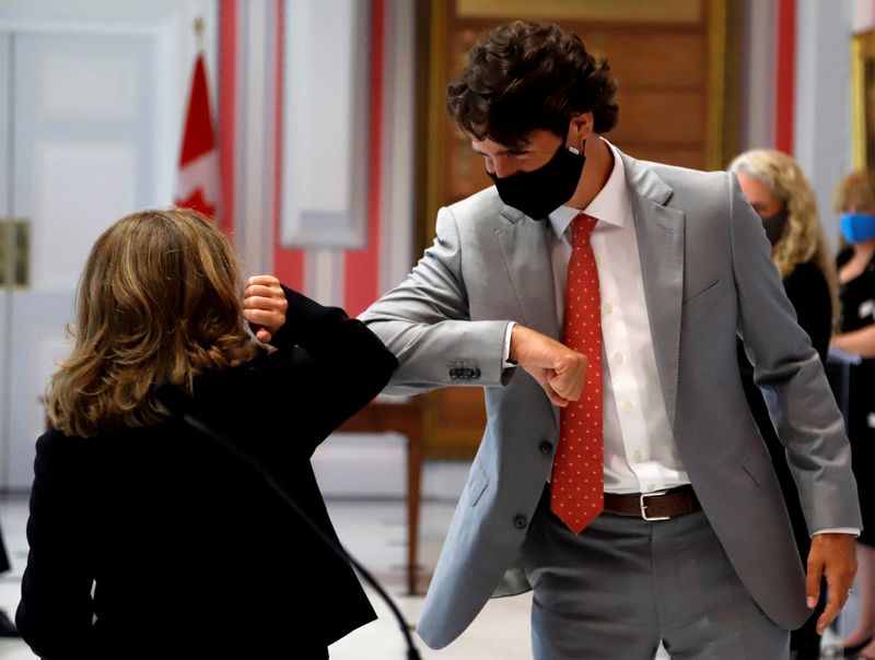 © Reuters. Freeland elbow bumps Canadian PM Trudeau after she is sworn in as finance minister at Rideau Hall in Ottawa