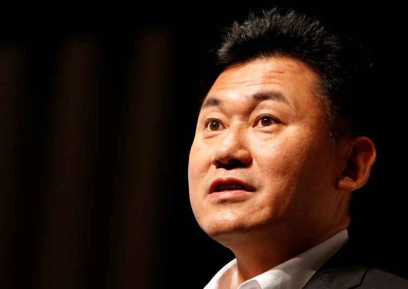 &copy; Reuters. FILE PHOTO: CEO of Japanese e-commerce firm Rakuten Inc Hiroshi Mikitani speaks during a news conference in Tokyo