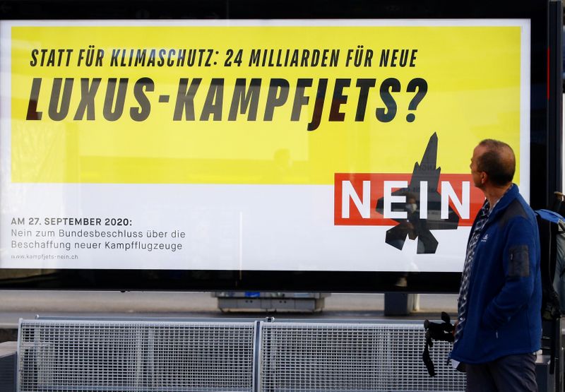 &copy; Reuters. A poster against the acquisition of new fighting jets is seen in Adliswil