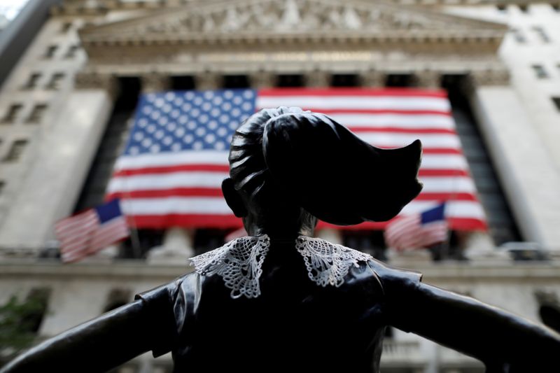 &copy; Reuters. A jabot collar is seen placed on the Fearless Girl statue outside of the New York Stock Exchange (NYSE) in Manhattan, New York City