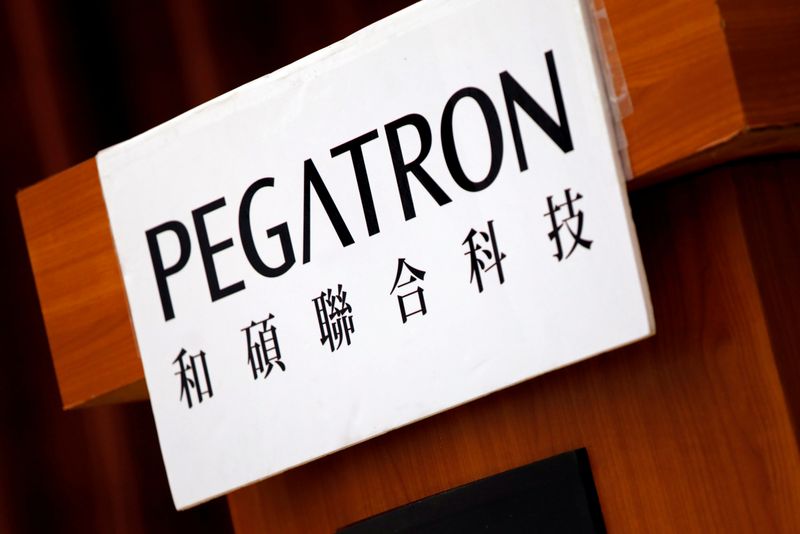 &copy; Reuters. The logo of Pegatron, which assembles electronics from Apple Inc’s iPhones, is seen during an annual general meeting in Taipei