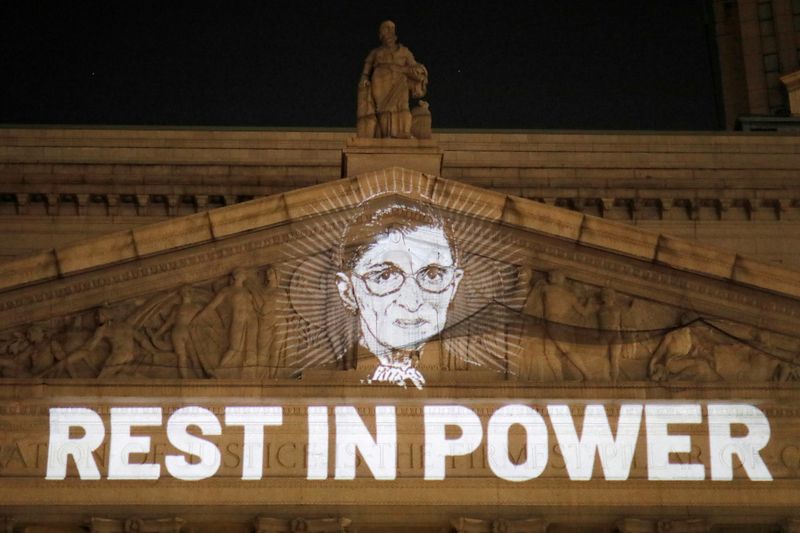 &copy; Reuters. FILE PHOTO: An image of Associate Justice of the Supreme Court of the United States Ruth Bader Ginsburg is projected onto the New York State Civil Supreme Court building in Manhattan, New York City, U.S. after she passed away