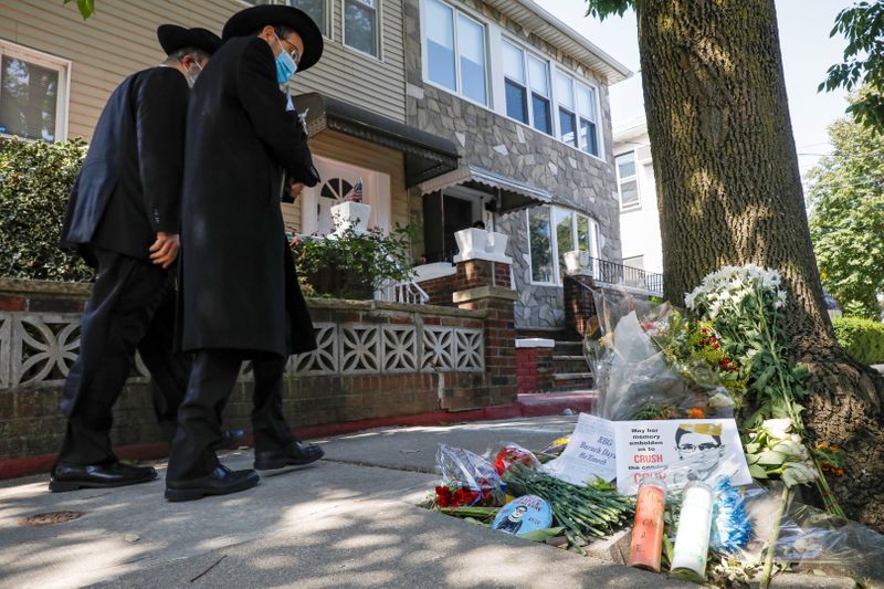 &copy; Reuters. A makeshift memorial for recently passed Associate Justice of the Supreme Court of the United States Ruth Bader Ginsburg is seen outside her childhood home in Brooklyn, New York