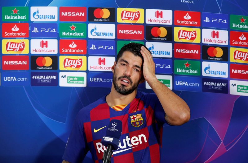 © Reuters. Il calciatore uruguaiano e attaccante del Barcellona Luis Suarez