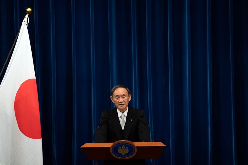 &copy; Reuters. Yoshihide Suga speaks during a news conference following his confirmation as Prime Minister of Japan in Tokyo