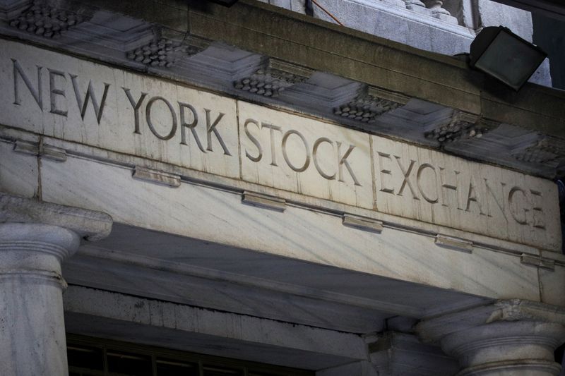 © Reuters. The 11 Wall St. door of the NYSE is seen in New
