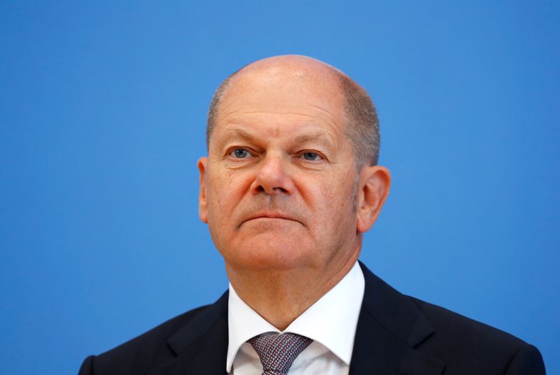 © Reuters. German Finance Minister Olaf Scholz presents the federal government's 2021 draft budget, in Berlin