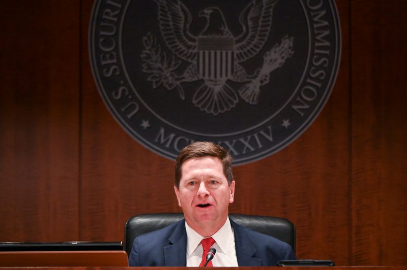 © Reuters. FILE PHOTO: Chairman Clayton participates in a U.S Securities and Exchange Commission open meeting to propose changing its definition of an 