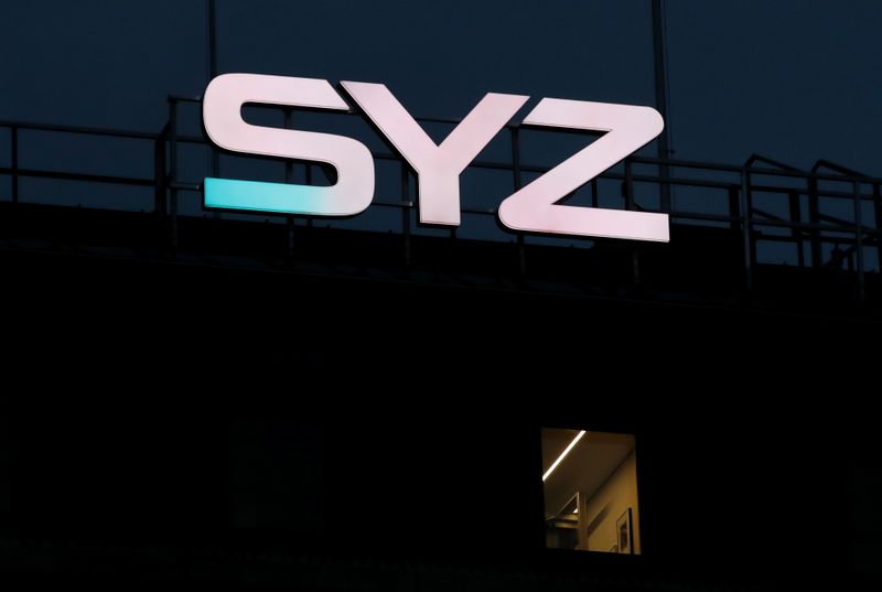 &copy; Reuters. A logo of Swiss private bank Syz is pictured on a building in Geneva