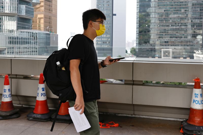 &copy; Reuters. FILE PHOTO: Joshua Wong leaves High Court in Hong Kong