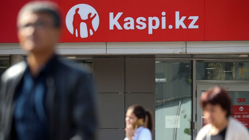 &copy; Reuters. FILE PHOTO: The Kaspi Bank logo in seen at the bank&apos;s branch in Almaty