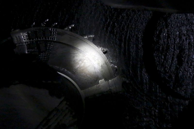 &copy; Reuters. FILE PHOTO: Part of a coal shearer pictured about 500 meters underground at the Boleslaw Smialy coal mine, a unit of coal miner Kompania Weglowa (KW) in Laziska Gorne