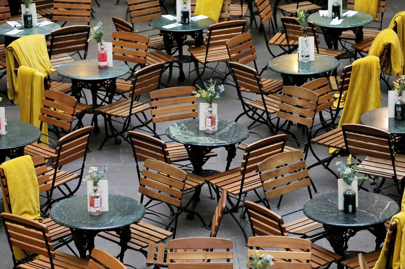 &copy; Reuters. FILE PHOTO: Restaurant seats stand empty in Covent Garden in London, Britain