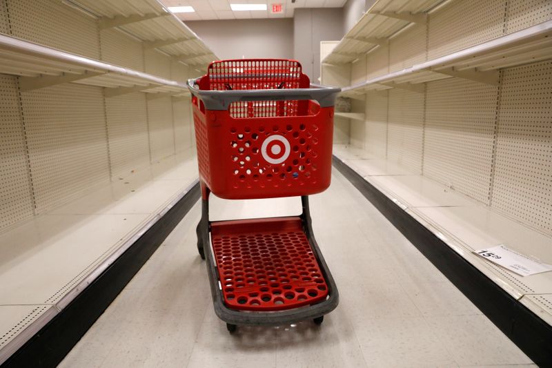 &copy; Reuters. A shopping cart sits in an aisle empty of cleaning products at Target store during the outbreak of coronavirus disease (COVID-19) in New York