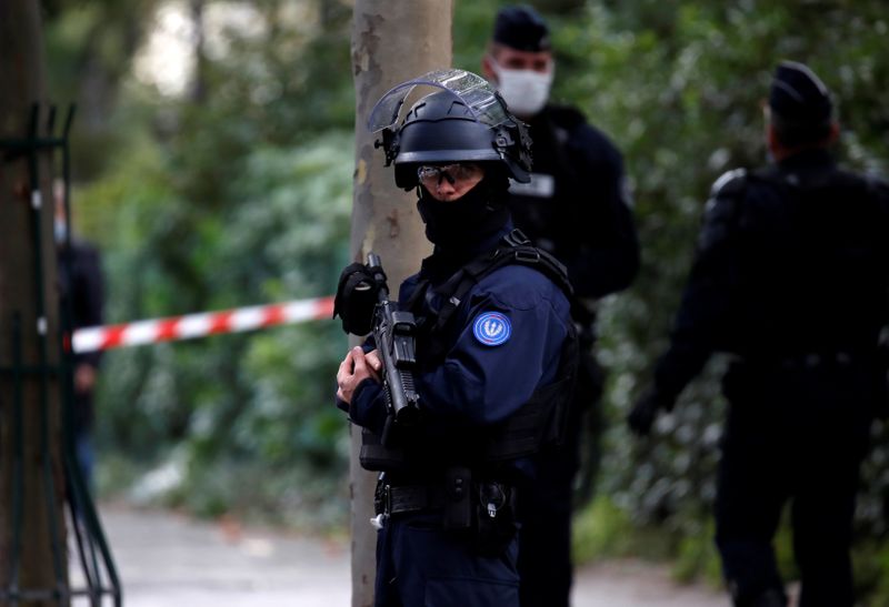 &copy; Reuters. Police operation ongoing near the former offices of Charlie Hebdo, in Paris