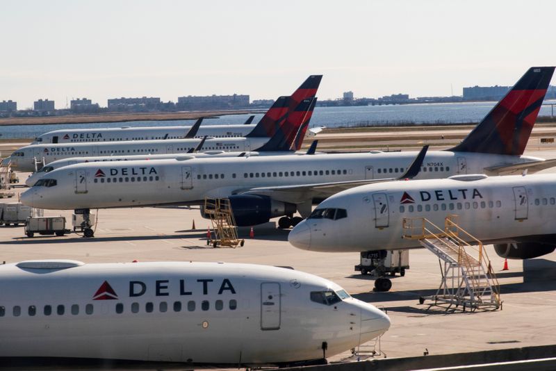 &copy; Reuters. FILE PHOTO: Delta planes are seen at the platform after the Federal Aviation Administration (FAA) temporarily halted flights arriving at New York City airports due to coronavirus disease (COVID-19) in New York