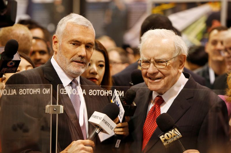&copy; Reuters. FILE PHOTO: Warren Buffett talks with Mark Donegan CEO of Precision Castparts during the Berkshire Hathaway Annual Shareholders Meeting in Omaha Nebraska