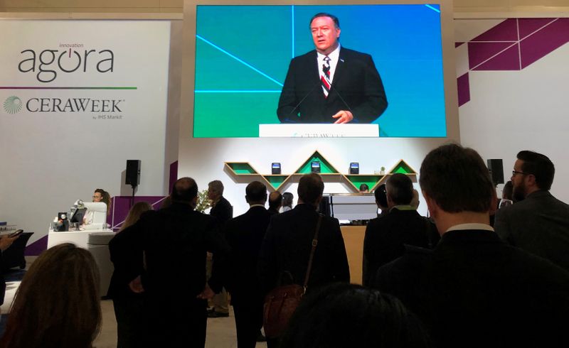 &copy; Reuters. FILE PHOTO: Attendees at IHS Markit’s CERAWeek conference watch the keynote address by U.S. Secretary of State Mike Pompeo from the George Brown Convention Center in Houston