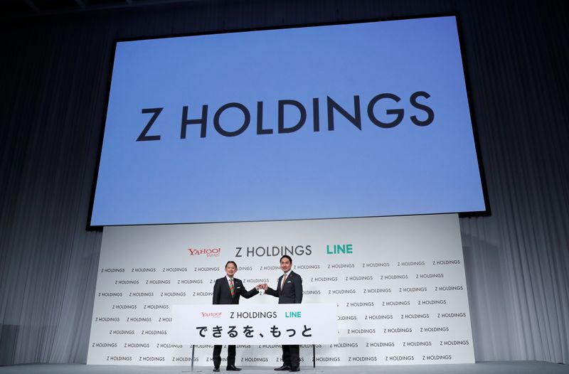 © Reuters. Co-CEOs of Z Holdings Kawabe and Idezawa hold a news conference in Tokyo