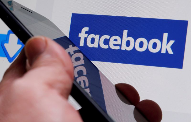 © Reuters. FILE PHOTO: The Facebook logo is displayed on their website in an illustration photo