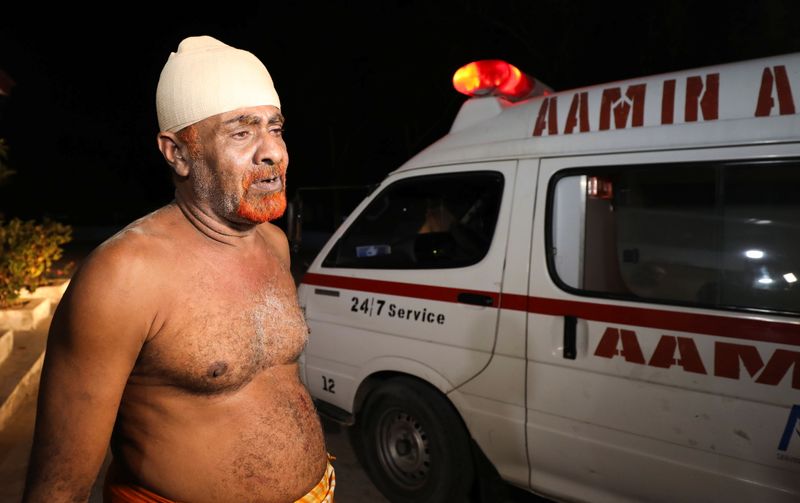 At least 20 killed by suicide car bomb near restaurant in Somalia capital