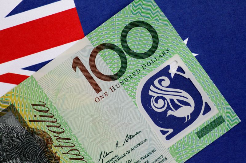 &copy; Reuters. FILE PHOTO: An Australia dollar note is seen in this illustration photo June 1, 2017. REUTERS/Thomas White/Illustration/File Photo