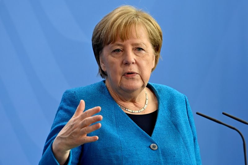 &copy; Reuters. 　ドイツのメルケル首相は１５日、石炭による火力発電の全廃時期を現在の２０３８年から前倒しする要求を拒否した。ベルリンで８日代表撮影（２０２１年　ロイター）