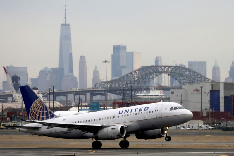 &copy; Reuters. FILE PHOTO: A United Airlines passenger jet takes off with New York City as a backdrop, at Newark Liberty International Airport, New Jersey, U.S. December 6, 2019. REUTERS/Chris Helgren/File Photo  GLOBAL BUSINESS WEEK AHEAD/File Photo