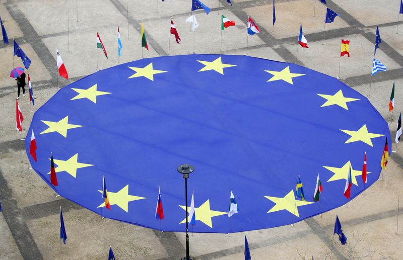 &copy; Reuters. A large European Union flag lies at the centre of Schuman square, outside the European Commission headquarters, on the eve of Europe Day, commemorating the declaration made by Robert Schuman in 1950, in Brussels, Belgium, May 8, 2021.  REUTERS/Yves Herman