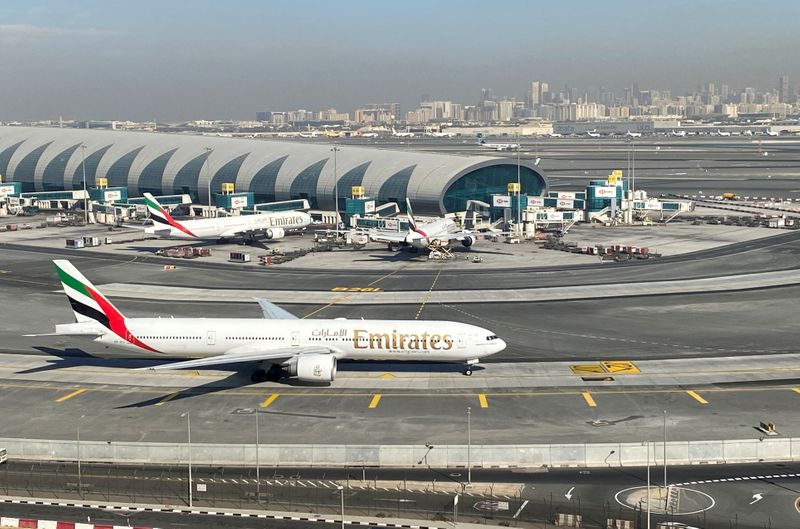 &copy; Reuters. FILE PHOTO: Emirates airliners are seen on the tarmac in a general view of Dubai International Airport in Dubai, United Arab Emirates January 13, 2021. Picture taken through a window. REUTERS/Abdel Hadi Ramahi/File Photo