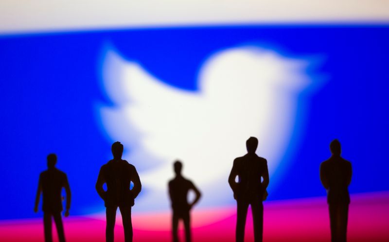 &copy; Reuters. Small toy figures are seen in front of Twitter logo and Russian flag colours in this illustration picture taken March 15, 2021. REUTERS/Dado Ruvic/Illustration