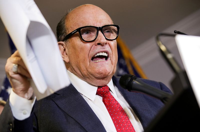 © Reuters. FILE PHOTO: Former New York City Mayor Rudy Giuliani, then-personal attorney to U.S. President Donald Trump, speaks about the 2020 U.S. presidential election results during a news conference in Washington, U.S., November 19, 2020. REUTERS/Jonathan Ernst/File Photo