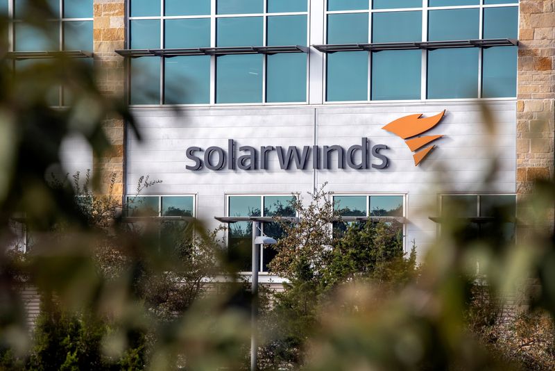 &copy; Reuters. FILE PHOTO: The SolarWinds logo is seen outside its headquarters in Austin, Texas, U.S., December 18, 2020. REUTERS/Sergio Flores