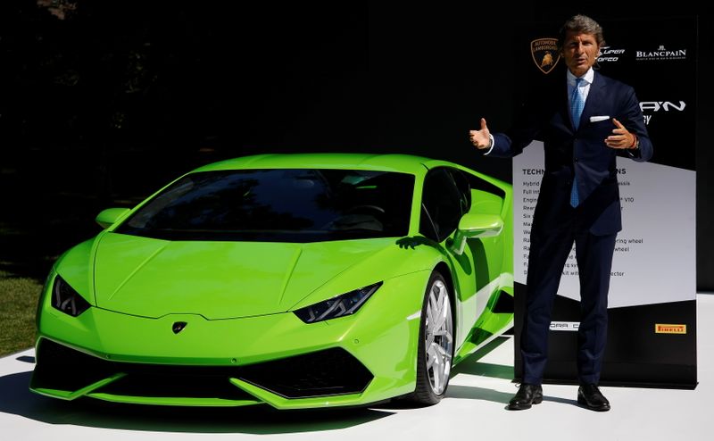 &copy; Reuters. FILE PHOTO: Automobili Lamborghini President and CEO Stephan Winkelmann stands with a Huracan during The Quail, A Motorsports Gathering car show in Carmel, California, August 15, 2014. REUTERS/Michael Fiala