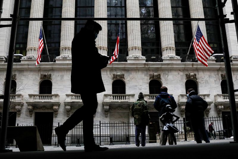 &copy; Reuters. FILE PHOTO: The Fearless Girl statue is seen outside the New York Stock Exchange (NYSE) in New York, U.S., February 12, 2021. REUTERS/Brendan McDermid