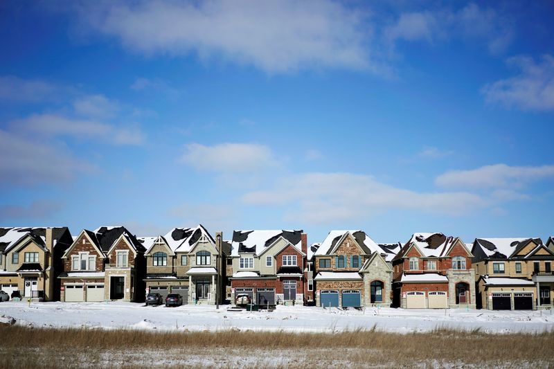 &copy; Reuters. FILE PHOTO: A row of houses stand in a newly built subdivision in East Gwillimbury, Ontario, Canada, January 30, 2018.   REUTERS/Mark Blinch/File Photo