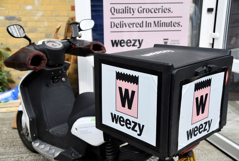 &copy; Reuters. An electric delivery bicycle is parked at the Lambeth depot of online supermarket Weezy, amidst the expansion of rapid grocery delivery firms, London, Britain, May 12, 2021. REUTERS/Toby Melville