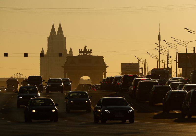 &copy; Reuters. Cars drive along a road during sunset in Moscow, Russia March 11, 2021.  REUTERS/Evgenia Novozhenina