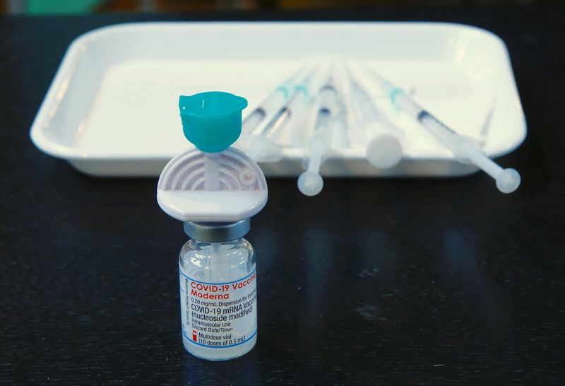 &copy; Reuters. FILE PHOTO: A  vial containing the Moderna COVID-19 vaccine is seen at a temporarily vaccination center of Swiss Medix health center as the spread of the coronavirus disease continues, in the Offene St. Jakob Kirche Reformed church in Zurich, Switzerland 