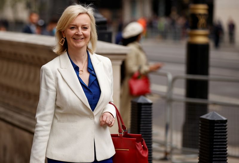 &copy; Reuters. FILE PHOTO: Britain's Trade Minister Liz Truss walks after the ceremony of State Opening of Parliament at the Palace of Westminster, amid the coronavirus disease (COVID-19) restrictions, in London, Britain, May 11, 2021. REUTERS/John Sibley