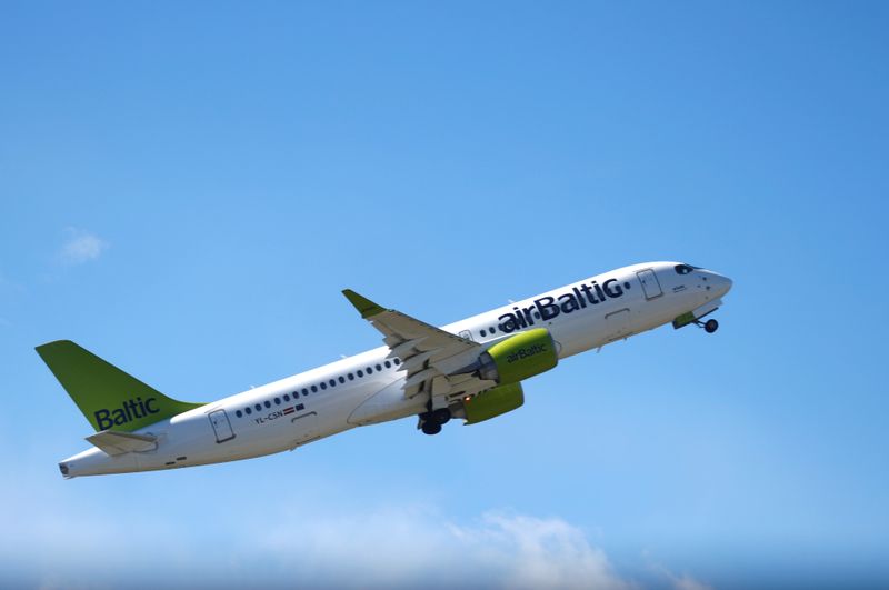 &copy; Reuters. AirBaltic Airbus 220-300 plane takes-off as flights resume during the coronavirus disease (COVID-19) outbreak in Riga international airport, Latvia May 18, 2020. REUTERS/Ints Kalnins