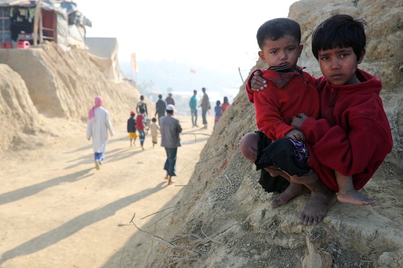 &copy; Reuters. FILE PHOTO: Rohingya refugee children look on at the Jamtoli camp in the morning in Cox's Bazar, Bangladesh, January 22, 2018. REUTERS/Mohammad Ponir Hossain