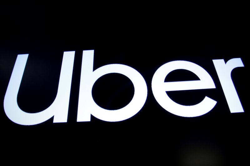 &copy; Reuters. FILE PHOTO: A screen displays the company logo for Uber Technologies Inc. on the day of it's IPO at the New York Stock Exchange (NYSE) in New York, U.S., May 10, 2019. REUTERS/Brendan McDermid/File Photo