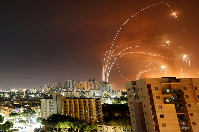 &copy; Reuters. FILE PHOTO: Streaks of light are seen as Israel's Iron Dome anti-missile system intercept rockets launched from the Gaza Strip towards Israel, as seen from Ashkelon, Israel, May 12.   REUTERS/Amir Cohen/File Photo