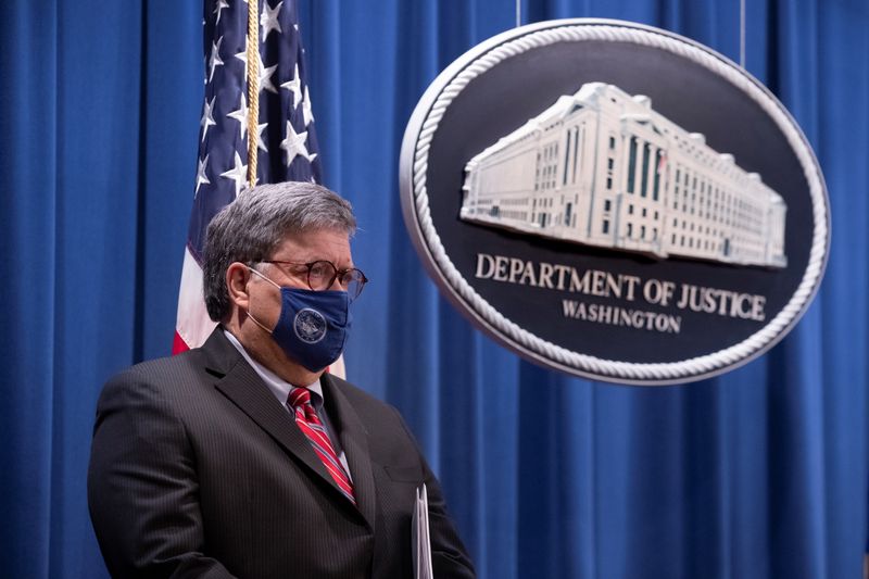 © Reuters. FILE PHOTO: US Attorney General William Barr participates in a news conference to provide an update on the investigation of the bombing of Pan Am flight 103 on the 32nd anniversary of the attack, at the US Department of Justice in Washington, D.C, U.S., December 21, 2020. Michael Reynolds/Pool via REUTERS