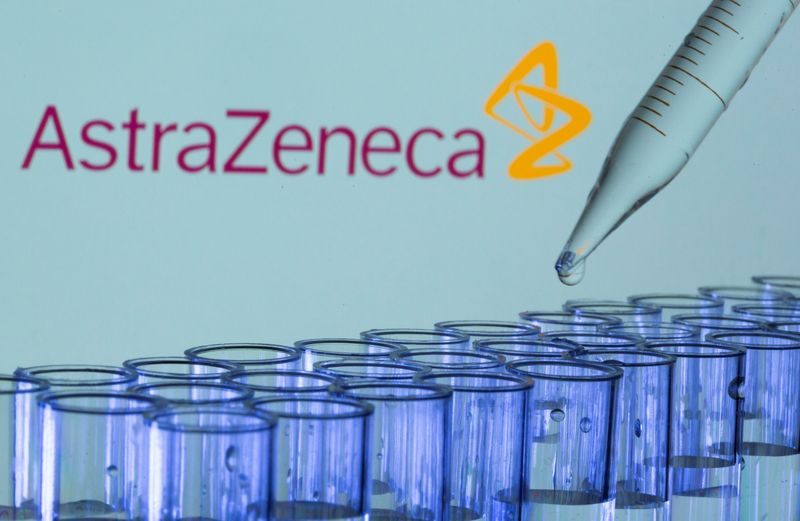 &copy; Reuters. FILE PHOTO: Test tubes are seen in front of a displayed AstraZeneca logo in this illustration taken, May 21, 2021. REUTERS/Dado Ruvic/Illustration