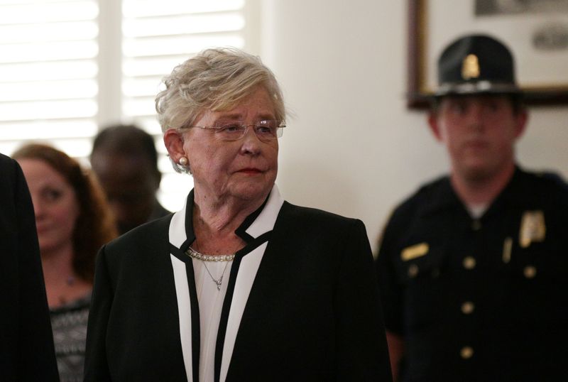 &copy; Reuters. FILE PHOTO: Lt Governor Kay Ivey waits to be sworn in shortly after Alabama Governor Robert Bentley announced his resignation amid impeachment proceedings on accusations stemming from his relationship with a former aide in Montgomery, Alabama, U.S., April