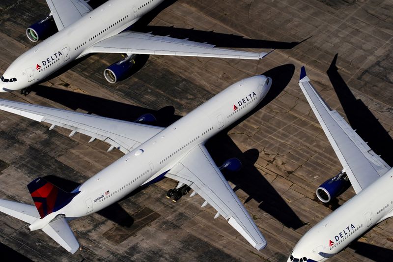 &copy; Reuters. FILE PHOTO: Delta Air Lines passenger planes are seen parked due to flight reductions made to slow the spread of coronavirus disease (COVID-19), at Birmingham-Shuttlesworth International Airport in Birmingham, Alabama, U.S. March 25, 2020.  REUTERS/Elijah
