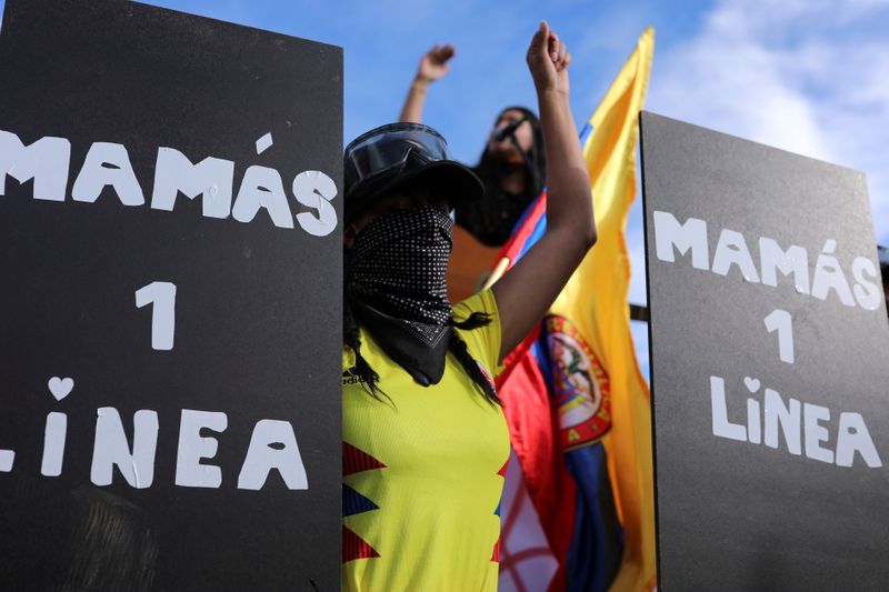 © Reuters. A woman who is part of the group of 